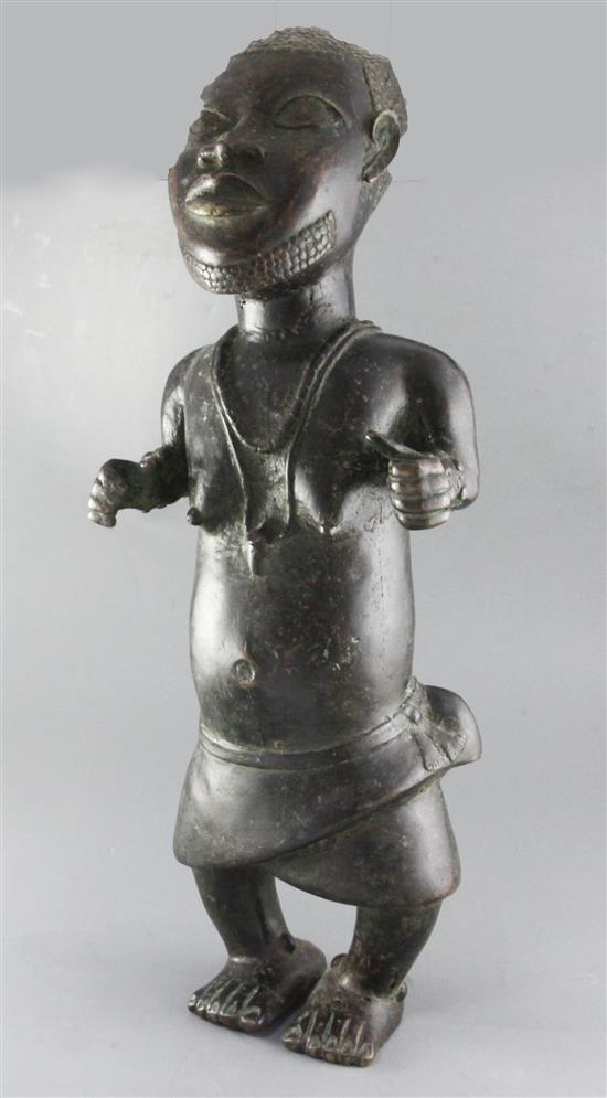 A large Benin bronze figure of a male dwarf, height 68cm